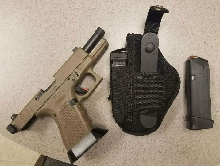 Police: Man Charged After Threatening Driver with Handgun