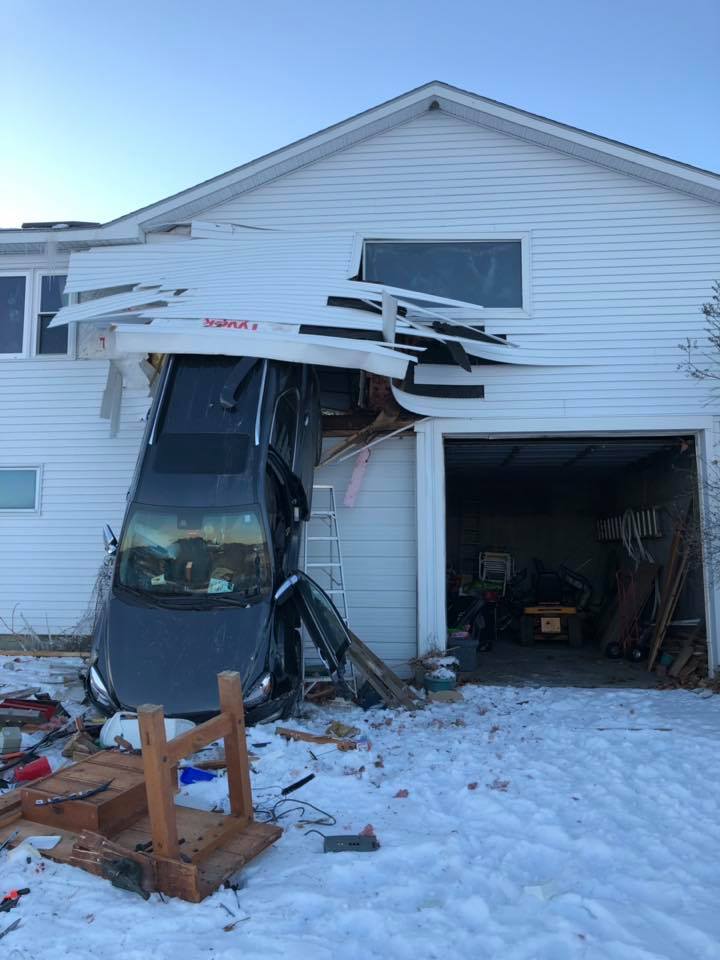 Car Goes Through Garage
