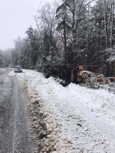 Police Close Road After Logging Truck Accident in Naples