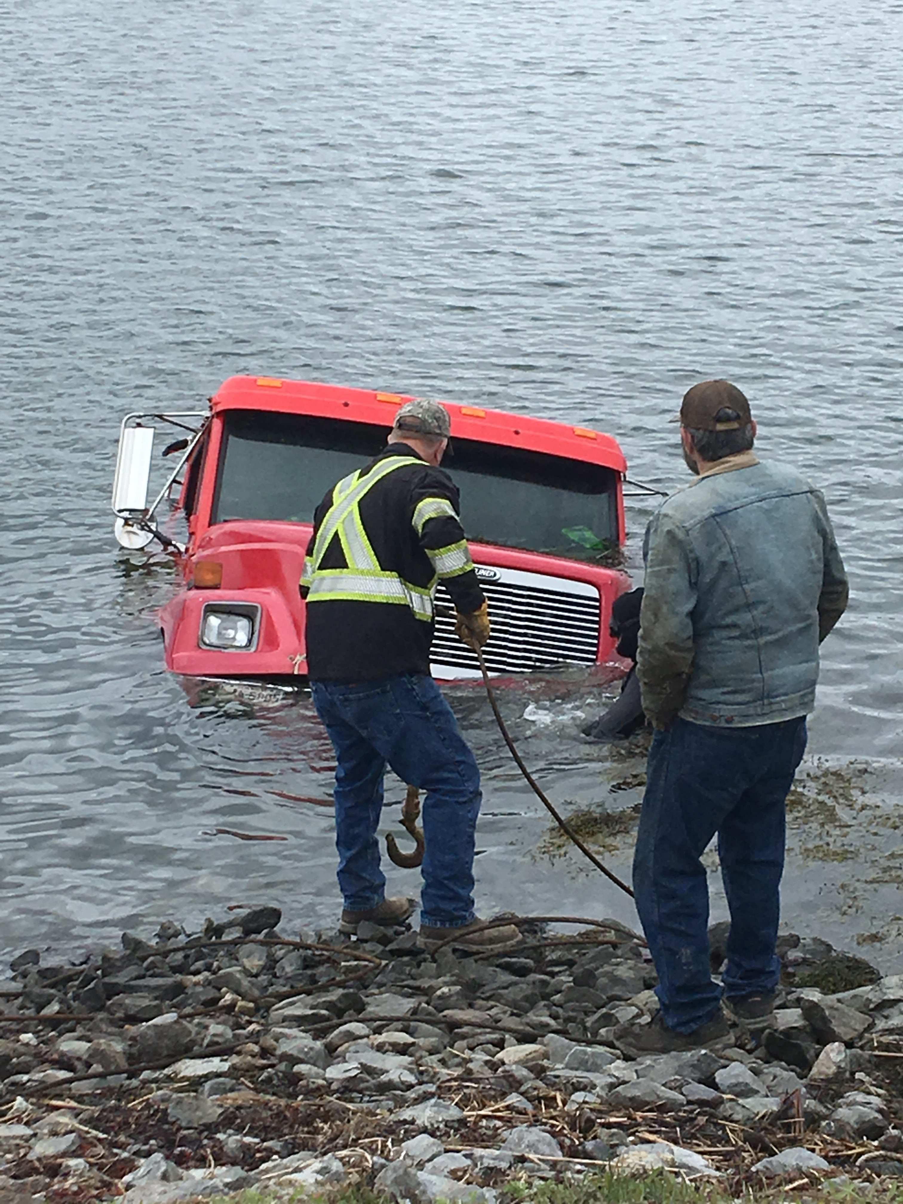 Commercial wrecker falls into ocean while trying to make delivery