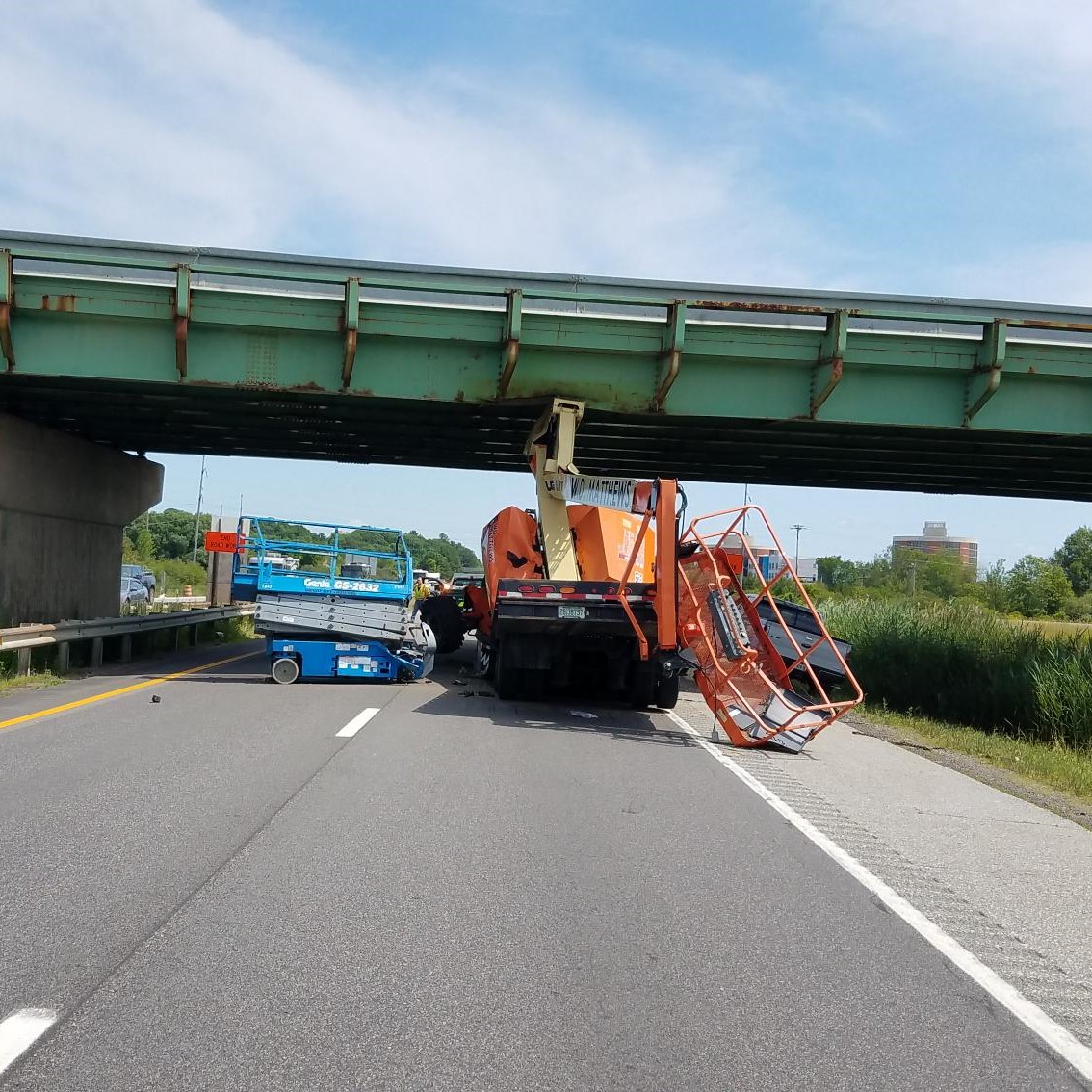 Truck carrying crane crashed into overpass on Maine Turnpike