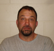 Raymond man accused of choking woman taken into custody