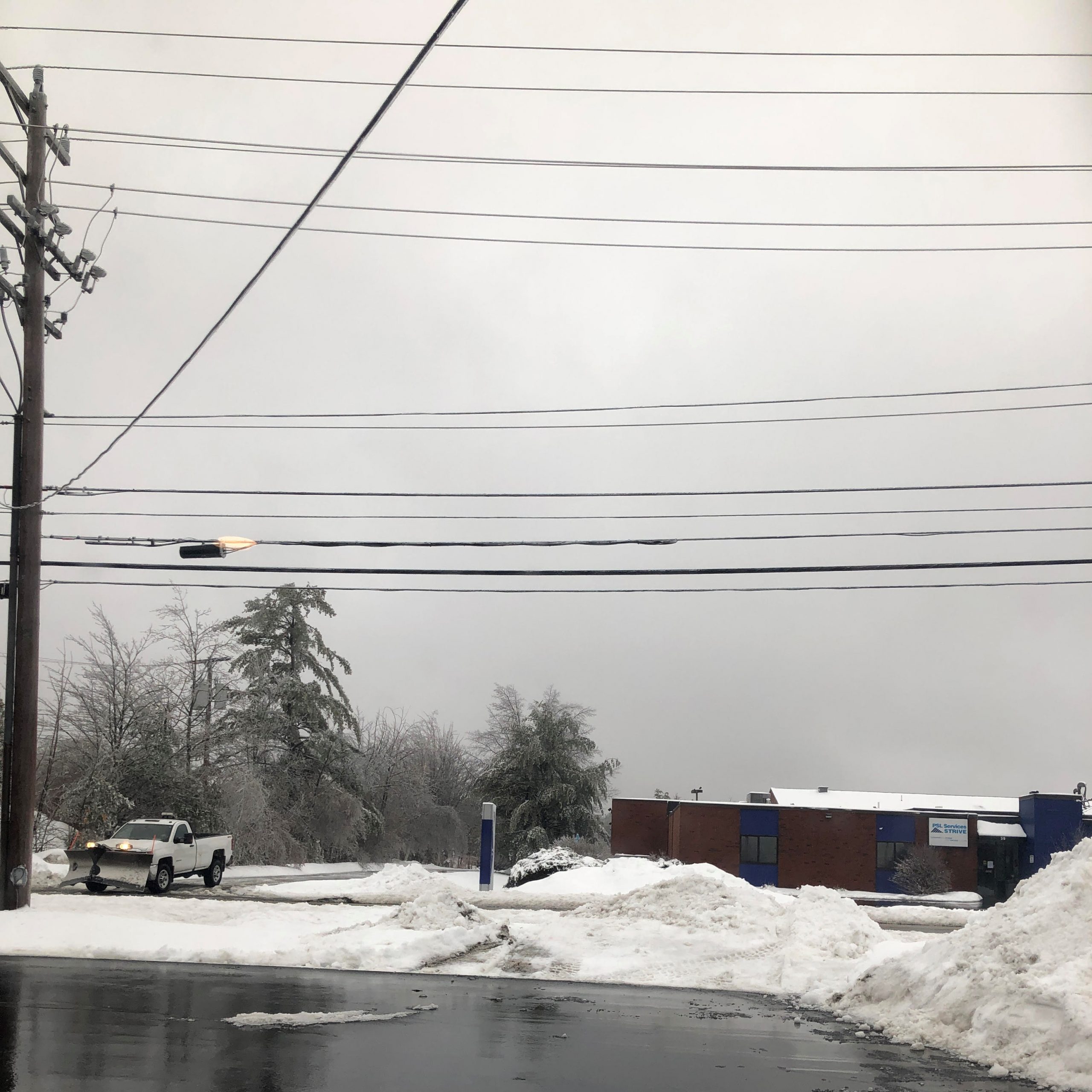 Sleet and freezing rain lead to slick road conditions and power outages