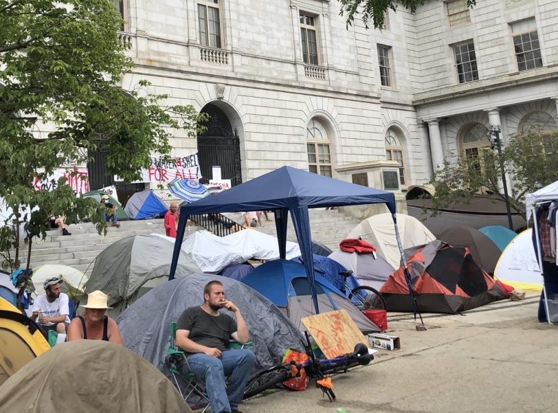 Organizer of homeless encampment meets mayor