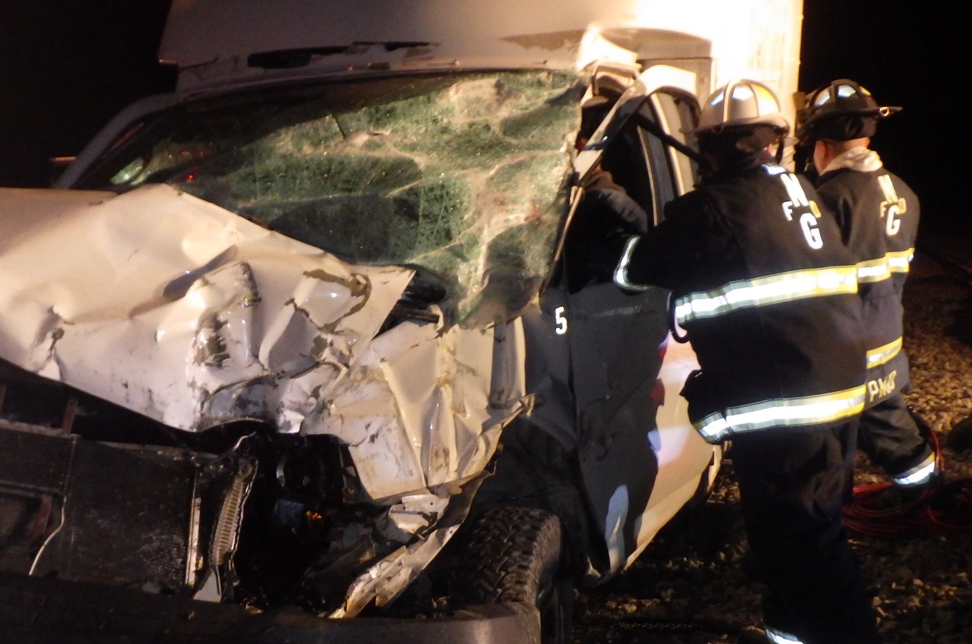 Winthrop man extricated from vehicle, taken to hospital after collision with train