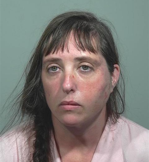 Casco woman accused of stabbing man at motel