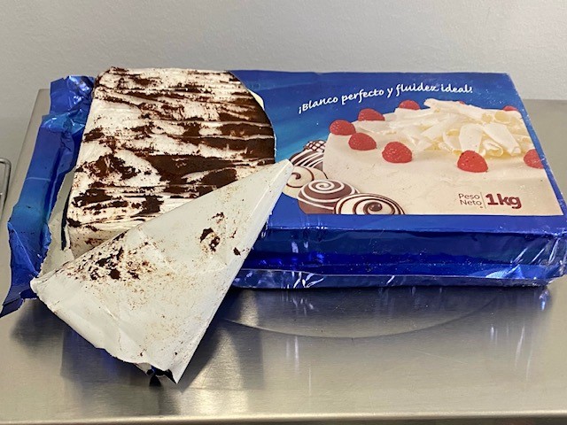 Two people charged after Maine drug agents seize cocaine disguised as cake