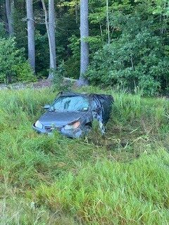 Maine Turnpike rollover sends two people to the hospital
