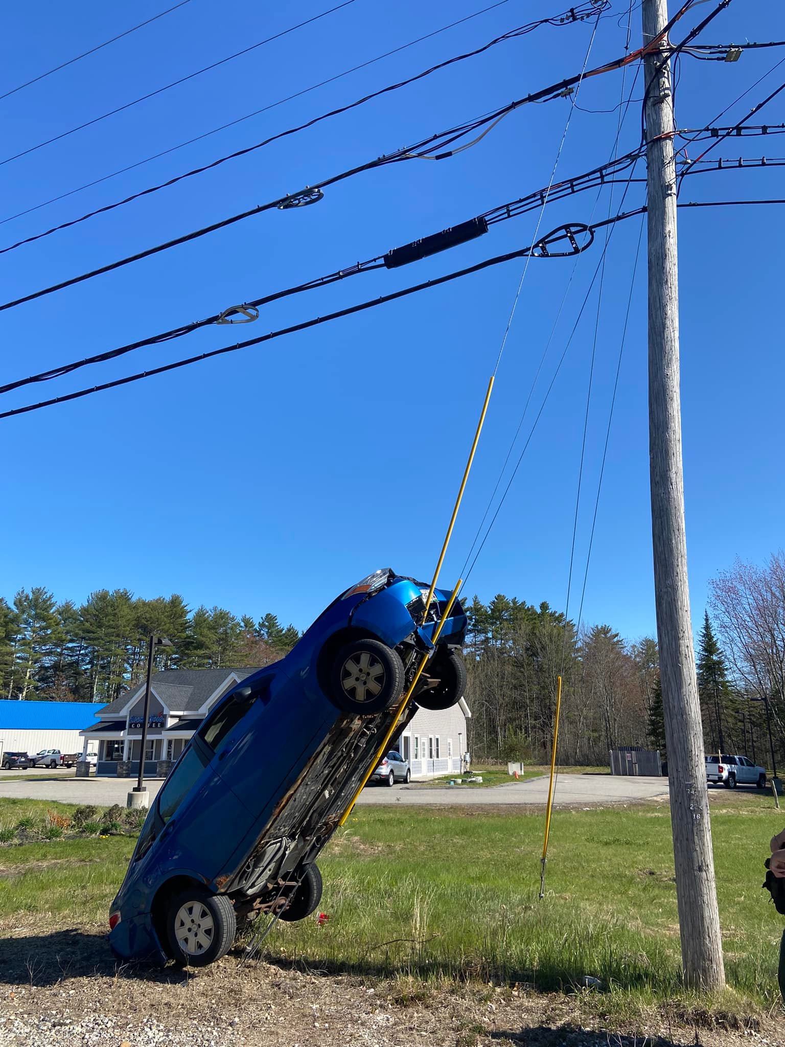 No injuries after crash leaves car on wires in York County