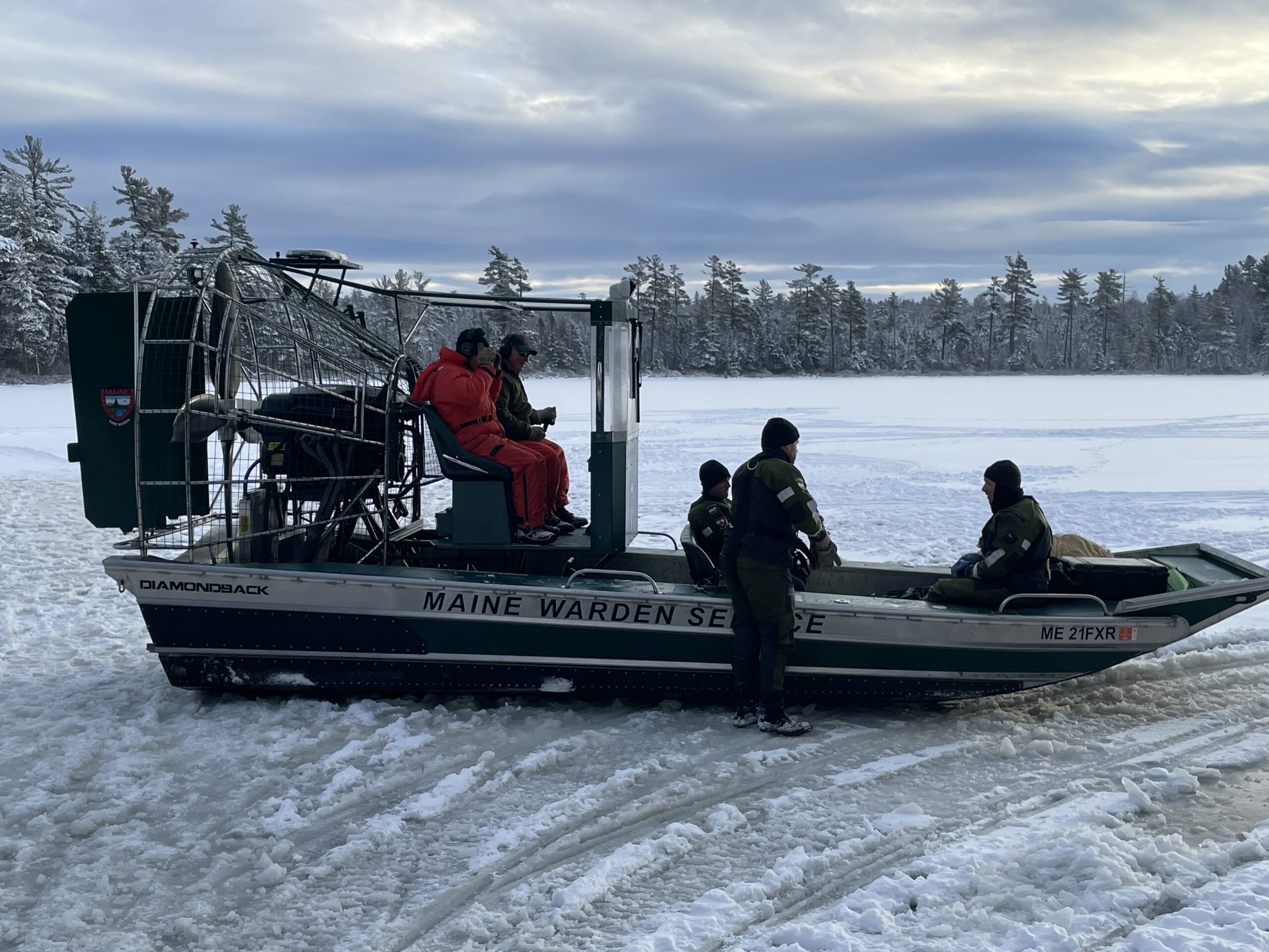 Body of snowmobiler recovered from lake in northern Maine