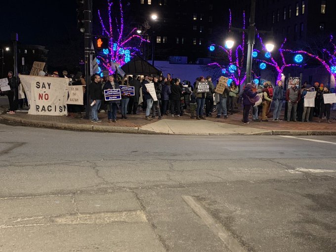 Portland community members protest ‘It’s Ok to be white’ banner displayed in park