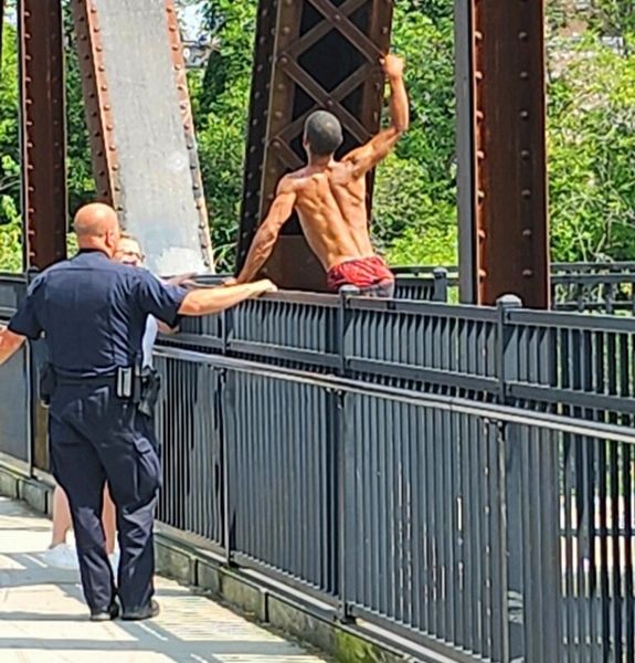 Auburn Police talk man down from jumping from bridge Sunday Auburn Police talk man down from jumping from bridge Sunday