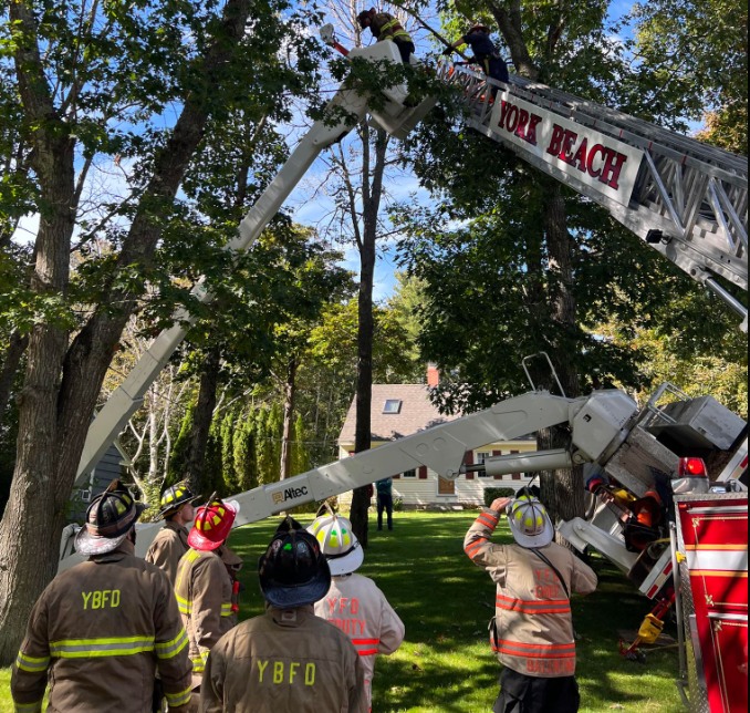 Crews rescue bucket truck occupant in York Beach