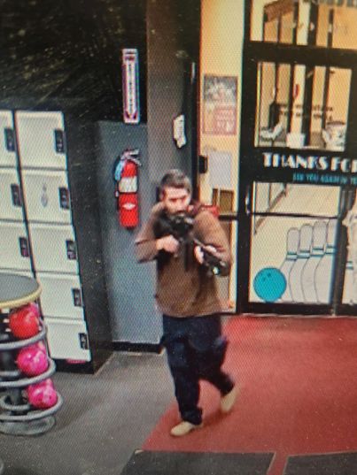 At least 16 dead in Maine mass killing and police hunt for the shooter as residents take shelter