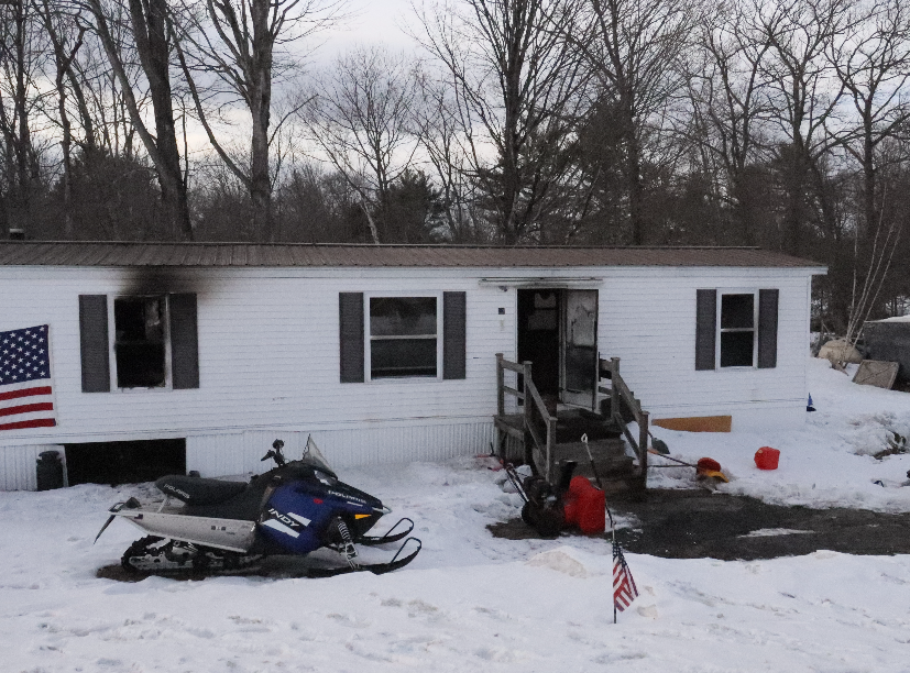 Buckfield homeowner charged after mobile home goes up in flames
