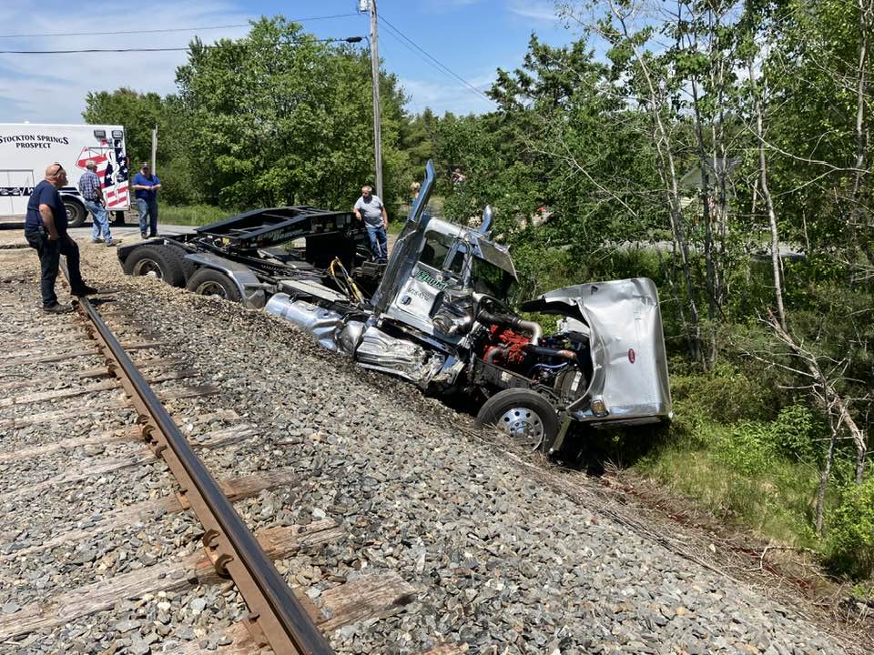 One person injured after tractor-trailer collides with train in Prospect