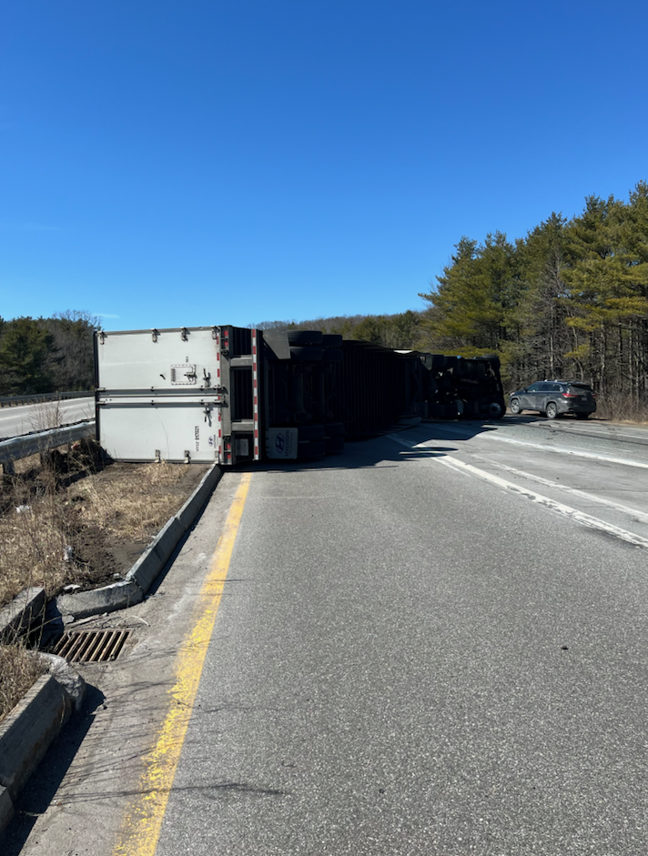 Driver suffers minor injuries after tractor-trailer rollover at Falmouth Spur