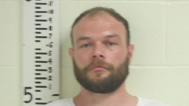 Maine man arrested for setting fire to camper on property that spread to house