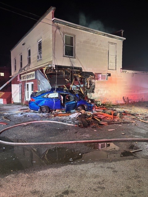 Building damaged by fire in Lewiston after police pursuit