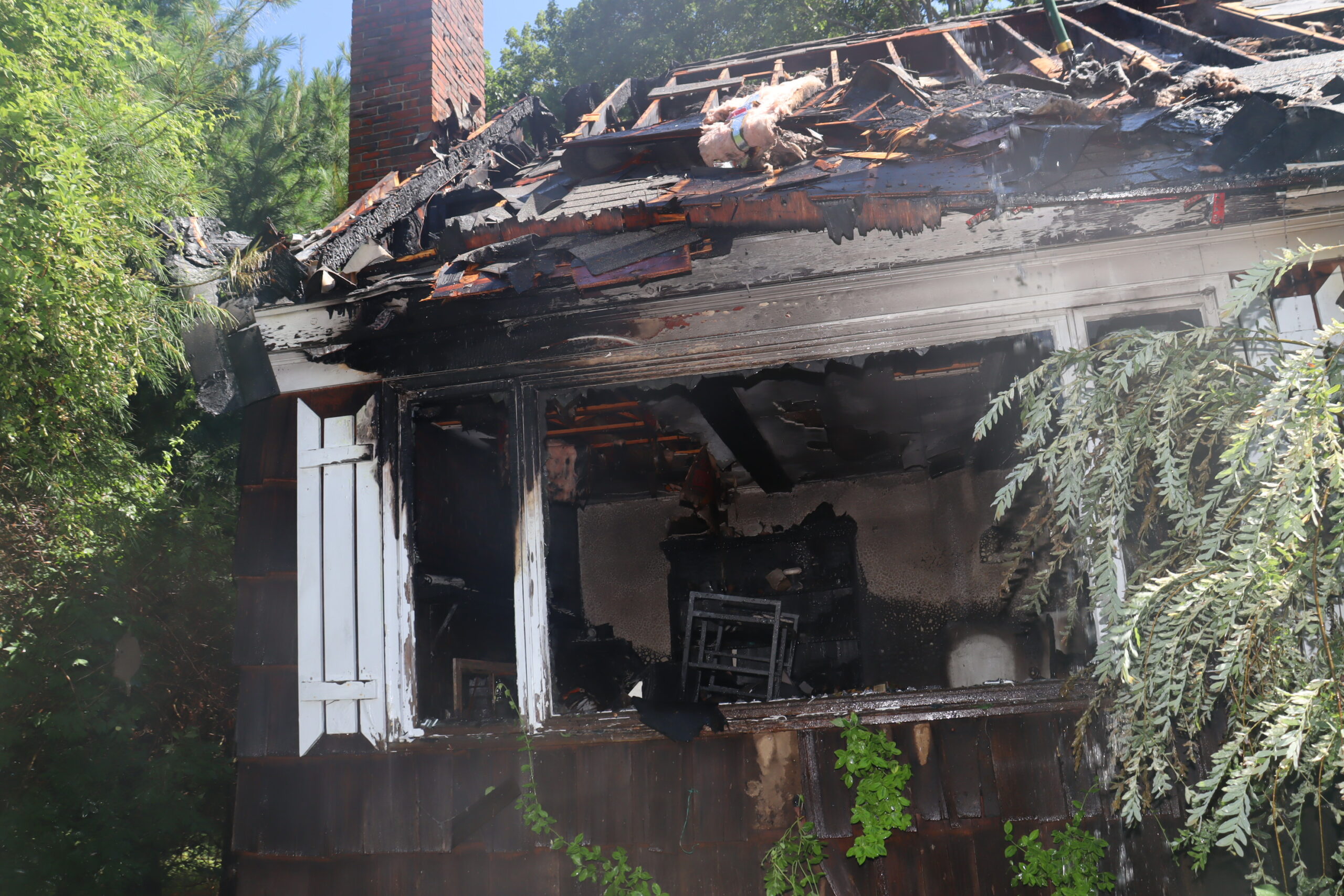 Firefighters pull two people from burning home in Portland