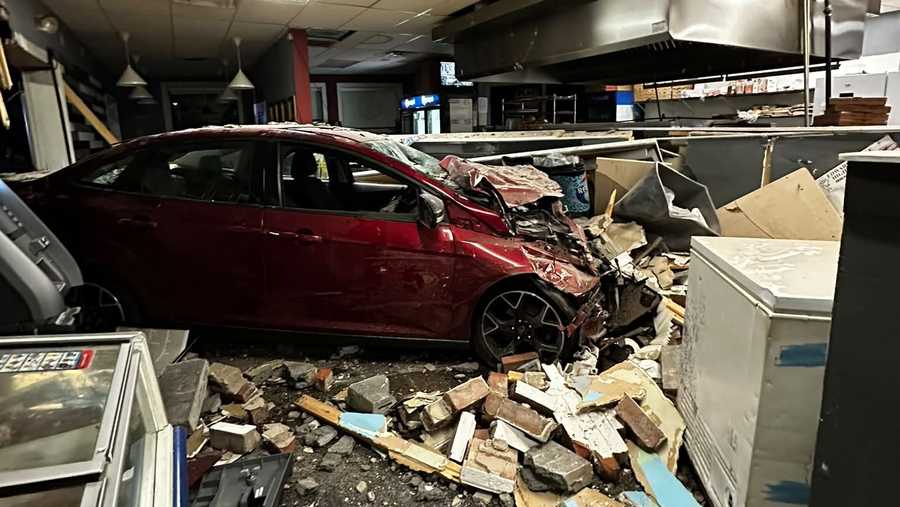 Car slams into Auburn Pizza and Variety Store